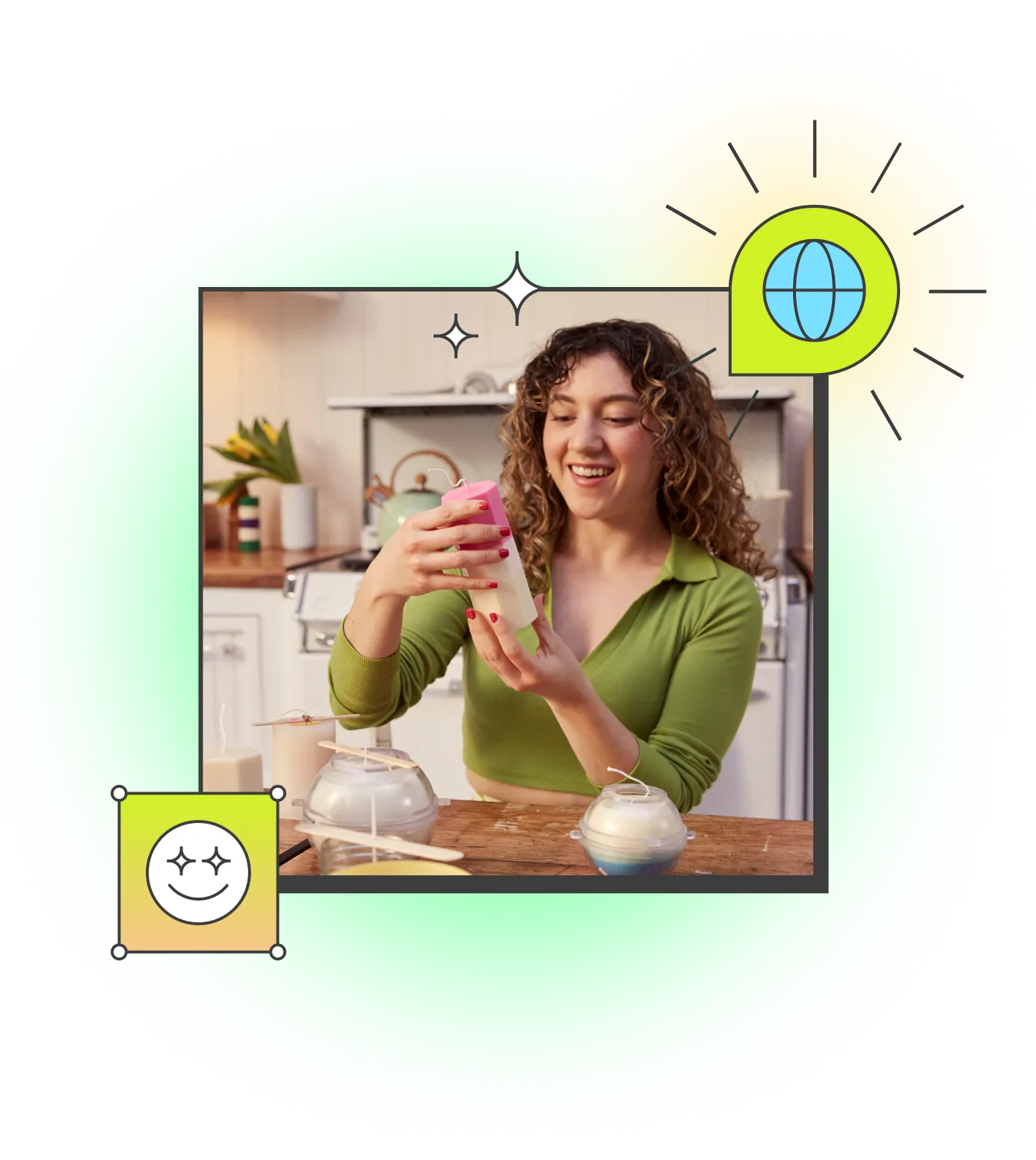 A female smiling while looking at a pink and white candle. There is a table in front of her with multiple candles and a teal coloured kettle on a stove and other items on the benchtop in the background.