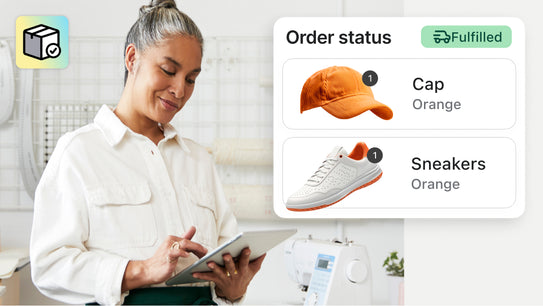 A business owner using a tablet to check orders, with overlaid order fulfillment UI showing a cap and sneakers being fulfilled. In the corner of the image is the PlatformDTC Fulfillment Network app icon.